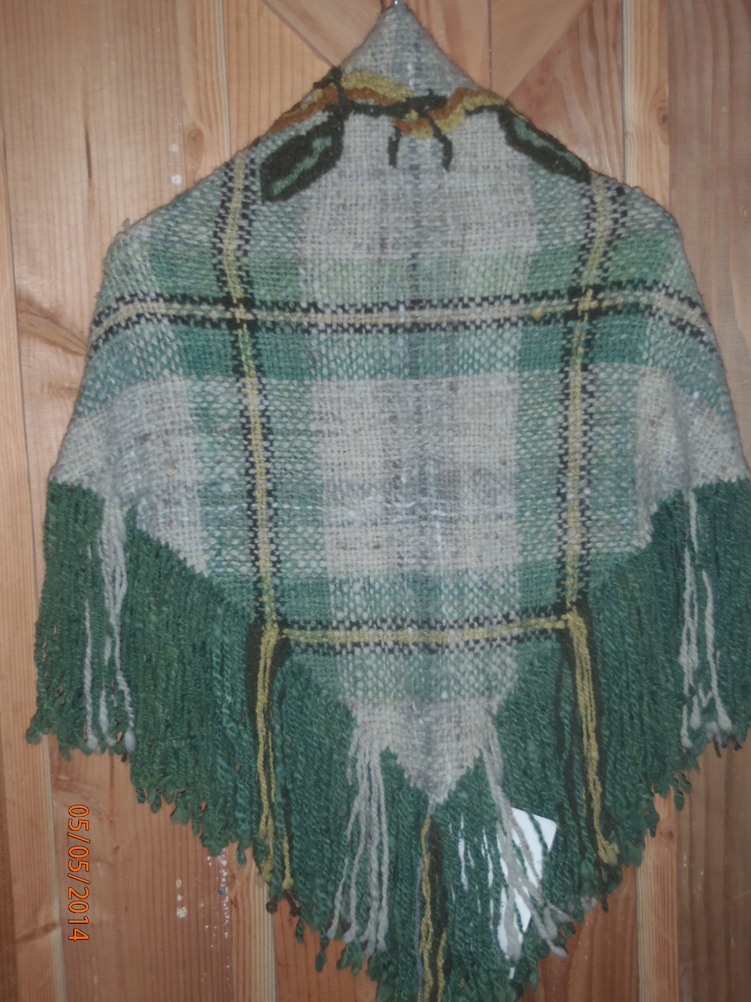Photo of the ilima and maile shawl back