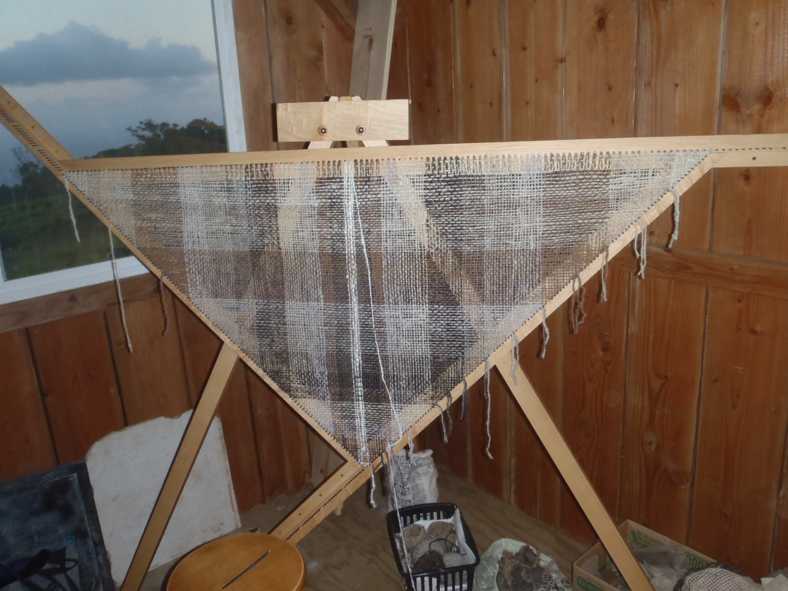 Photo of our triangular loom.