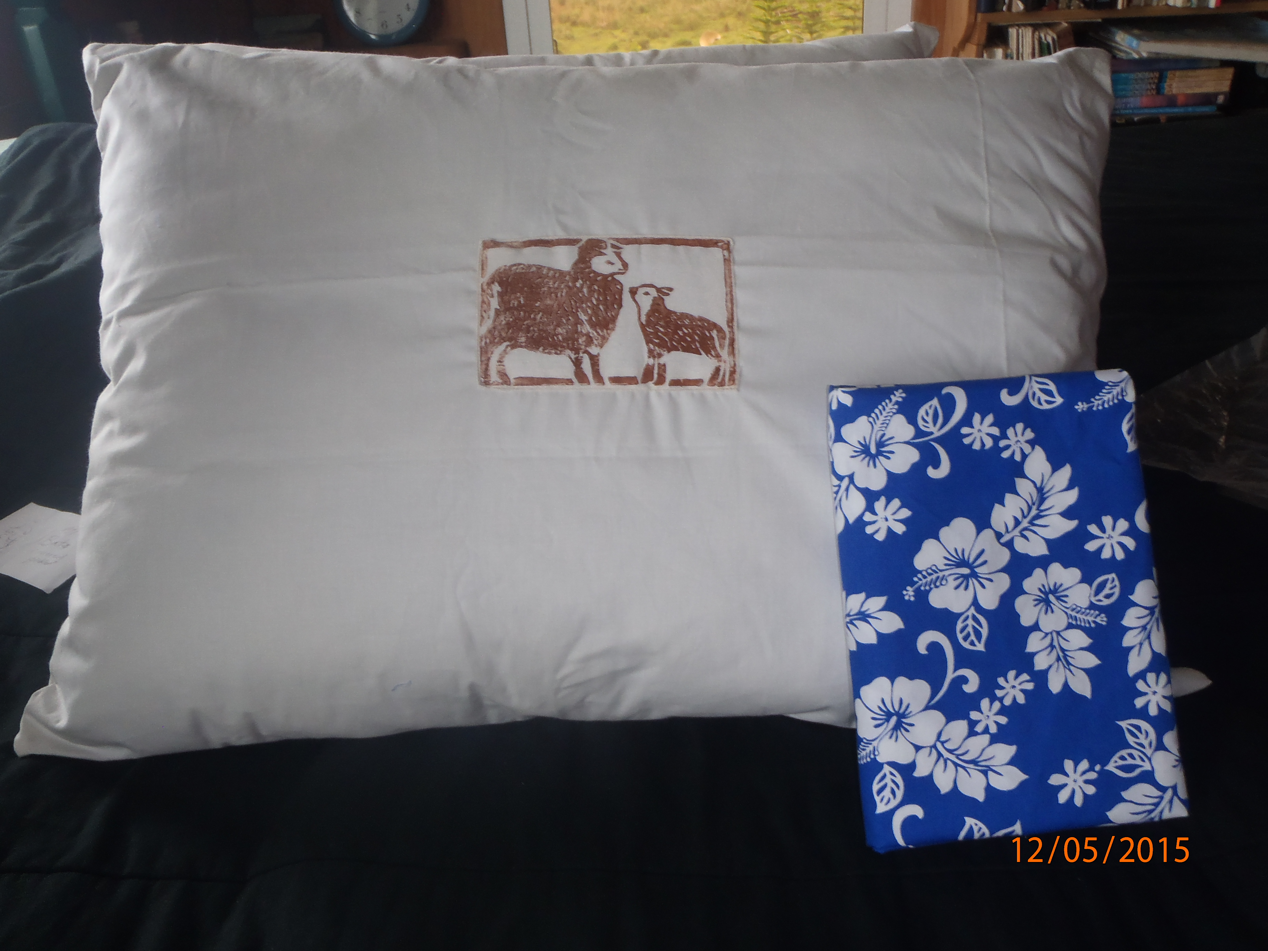 Pillow with Hawaiian print pillow case